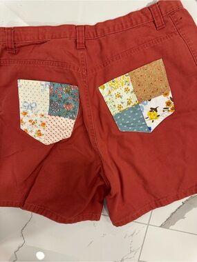 Essentials Rust Red Patchwork Pocket Bermuda Shorts